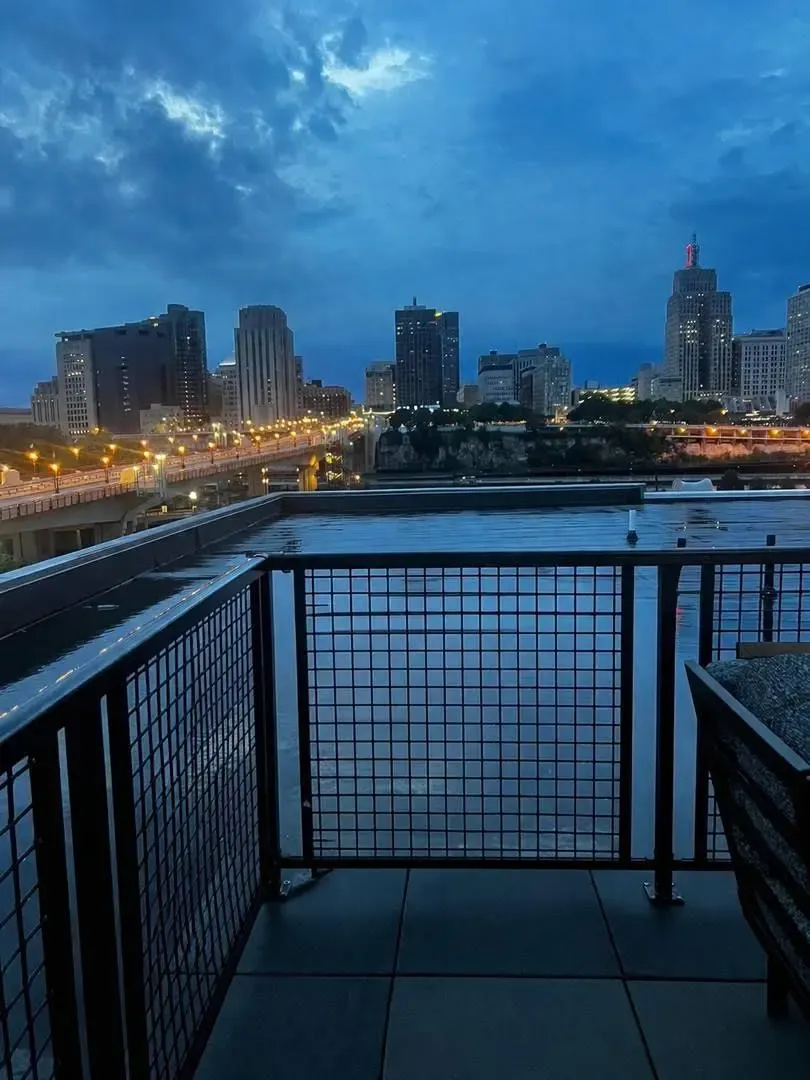 Night view of Downtown St. Paul from apartment balcony 