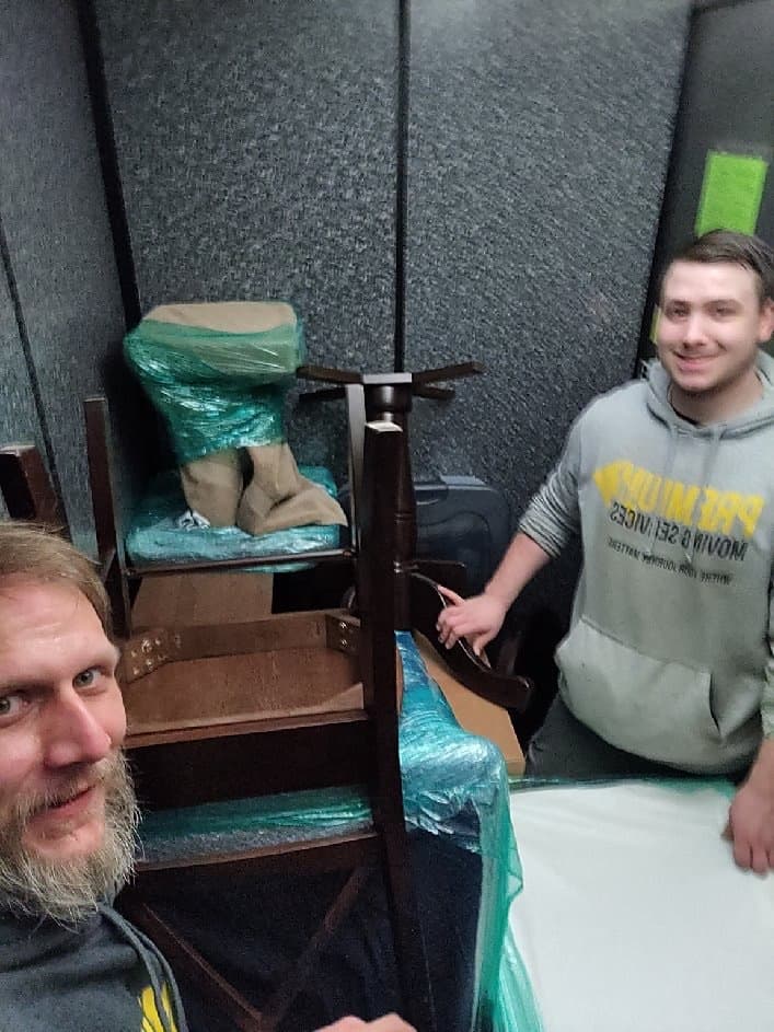 Local Movers Loading Up A Storage Unit