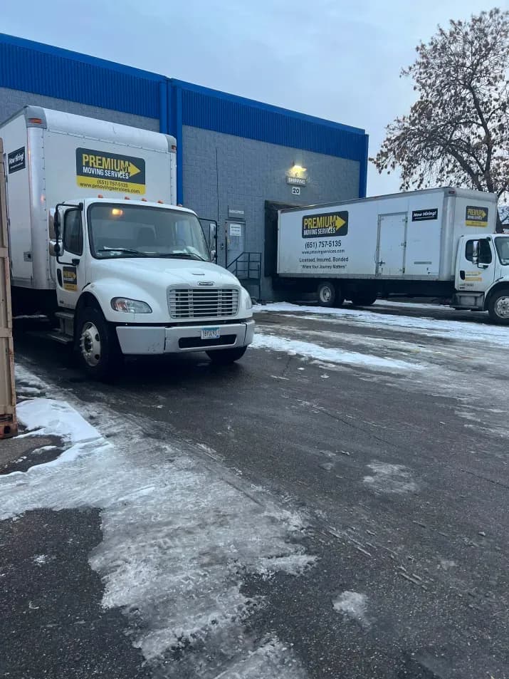 Two moving trucks parked