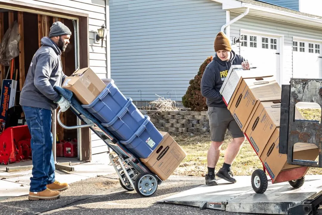 Deshun and Drake moving boxes